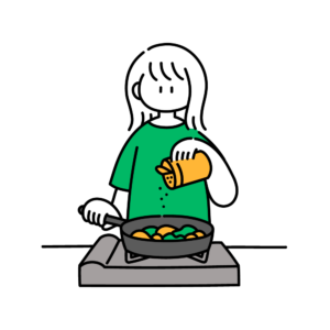 料理をしている女性のイラスト