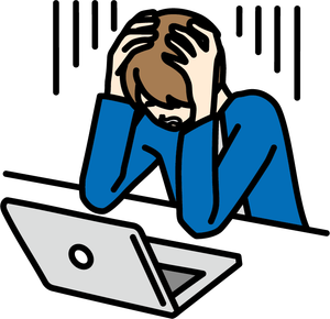 パソコンの前で頭を抱えている人のイラスト
